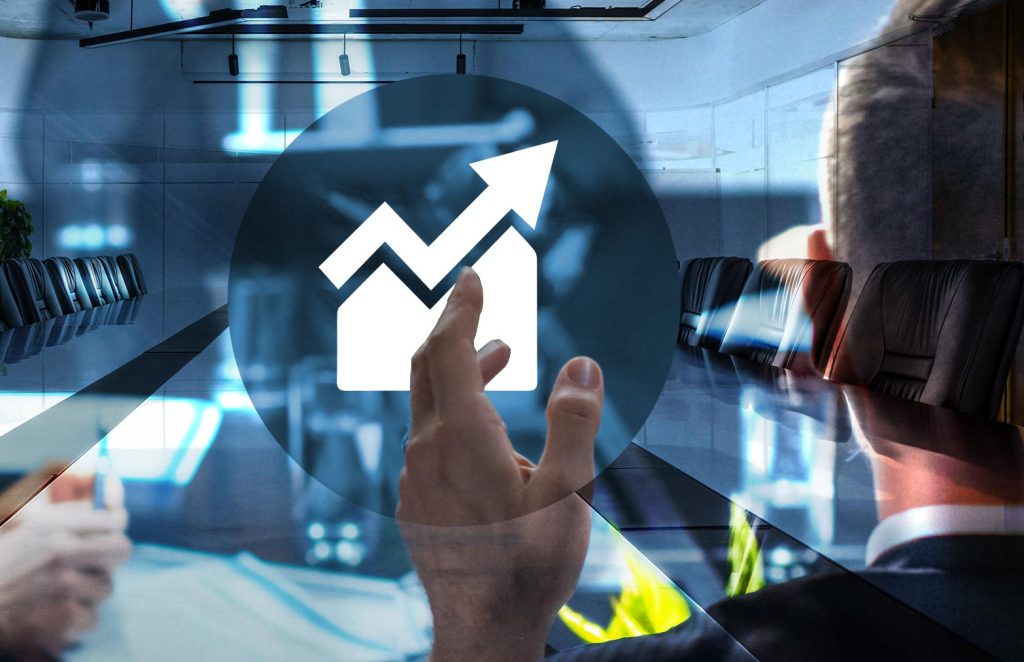 Financial Expert Kurs – Hand tippt im Boardroom auf ein Aufwärtstrend-Icon, das kontinuierliches Finanzwachstum symbolisiert